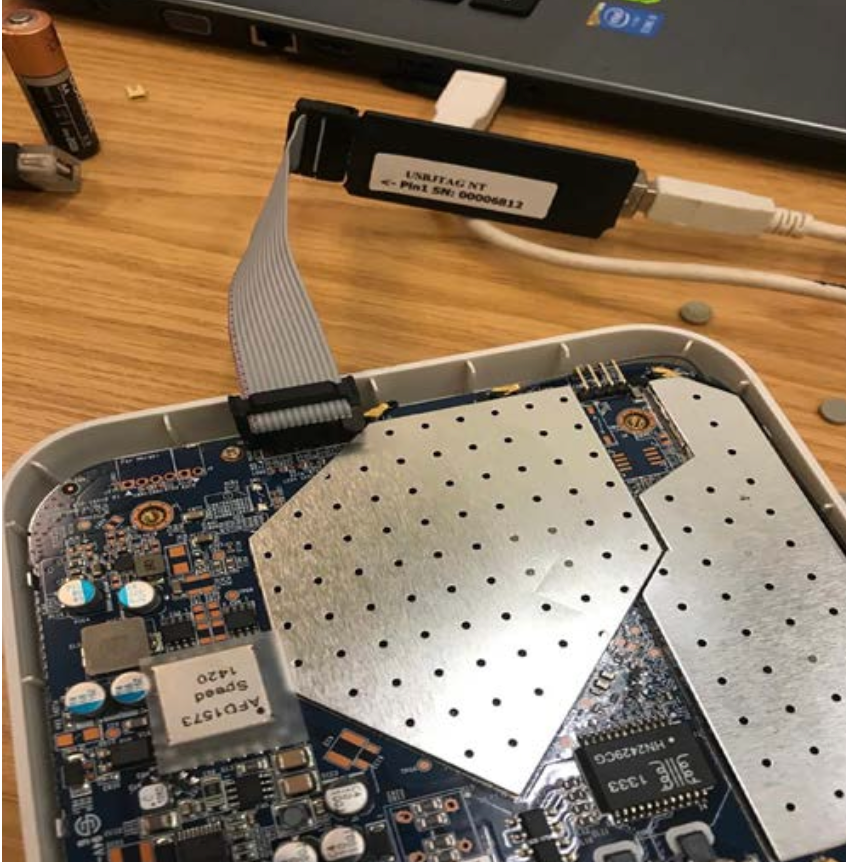 USB JTAG NT cable connecting to the Cisco Meraki router